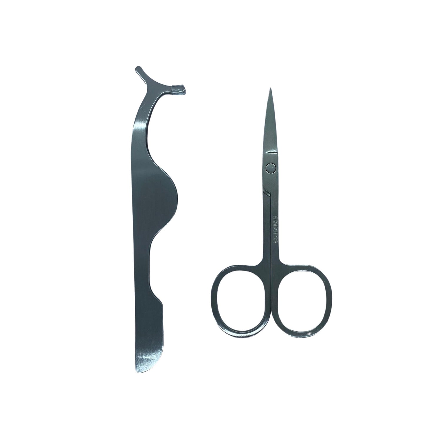 Lash Tool Set-Our Lash Tool Set includes a lash applicator and a pair of mini scissors for an easy lash application. The lash applicator allows you to easily apply/remove your lashes and the mini scissors are perfect for trimming the lash band length. The compact size makes it perfect to add to your makeup/travel bag. Description Includes: 1 Lash Applicator and 1 Pair of Mini Scissor Lash Applicator: Silver, Pink/White, Pink, or Black Mini Scissors: Silver, Pink, or Black Material: Stainless Ste