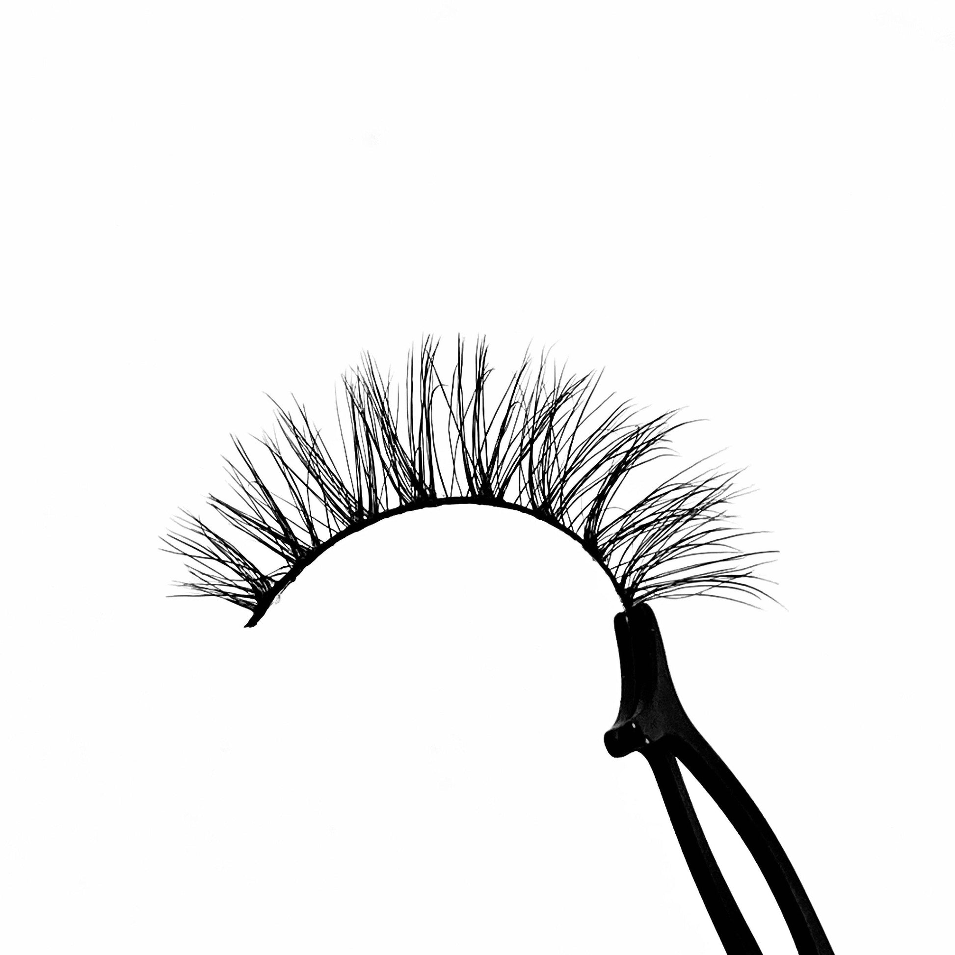 Butterfly-Medium Volume-“Butterfly” is a natural yet unique 3D lash that’s perfect for everyday looks. Our light volume “Butterfly” lashes add the finishing touch to any everyday, on the go, natural look. The unique design and cat-eye effect from these lashes will have you hooked! Description Handmade, Cruelty-Free, Wear up to 30x Material: 100% Mink Band: Black Cotton Band Volume: Medium Style: Wispy, Cat-eye, Flirty, Natural To Use: Measure and size your lashes by placing the false lash agains