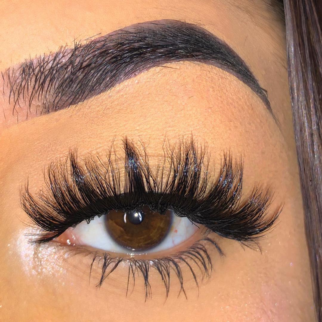 Hustla-High Volume-Sexy, sassy, and bold. The 3 moods guaranteed in our "Hustla" lashes. Pick "Hustla" for full volume, curl, and length. You'll always be picture ready in these glamorous mink lashes! Also available in our "Boss Up (3-Pack)" Description Handmade, Cruelty-Free, Wear up to 30x Material: 100% Mink Band: Thin, Black Cotton Band Volume: High Style: Dramatic, Long, Open-eye To Use: Measure and size your lashes by placing the false lash against your lash line where your natural lashes