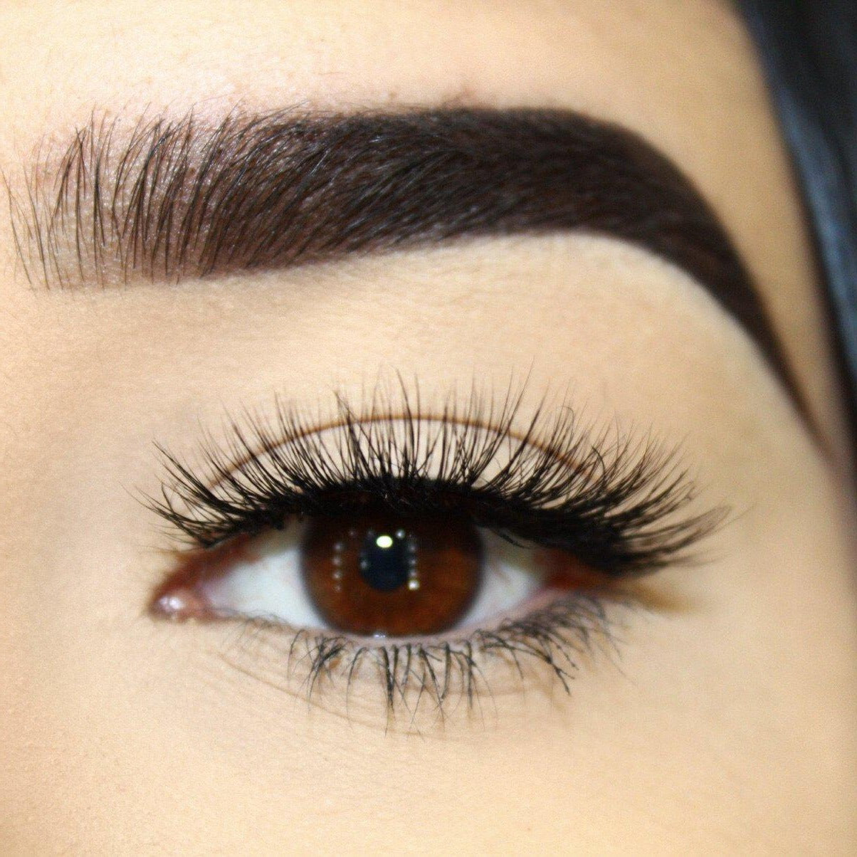 Jasmine-Medium Volume-Our 3D Mink Lashes in style “Jasmine” are a MUST HAVE. Grab a pair of "Jasmine" lashes to achieve a subtle, but “flirty” look. Whether it’s date night or a day out with the girls, these lashes are a staple to your beauty collection. They give you the perfect volume and suite most eye shapes. The longer hairs in the center create a beautiful effect to help bring out your eyes more. Also available in our "Best Sellers (3-Pack)" Description: Handmade, Cruelty-Free, Wear up to