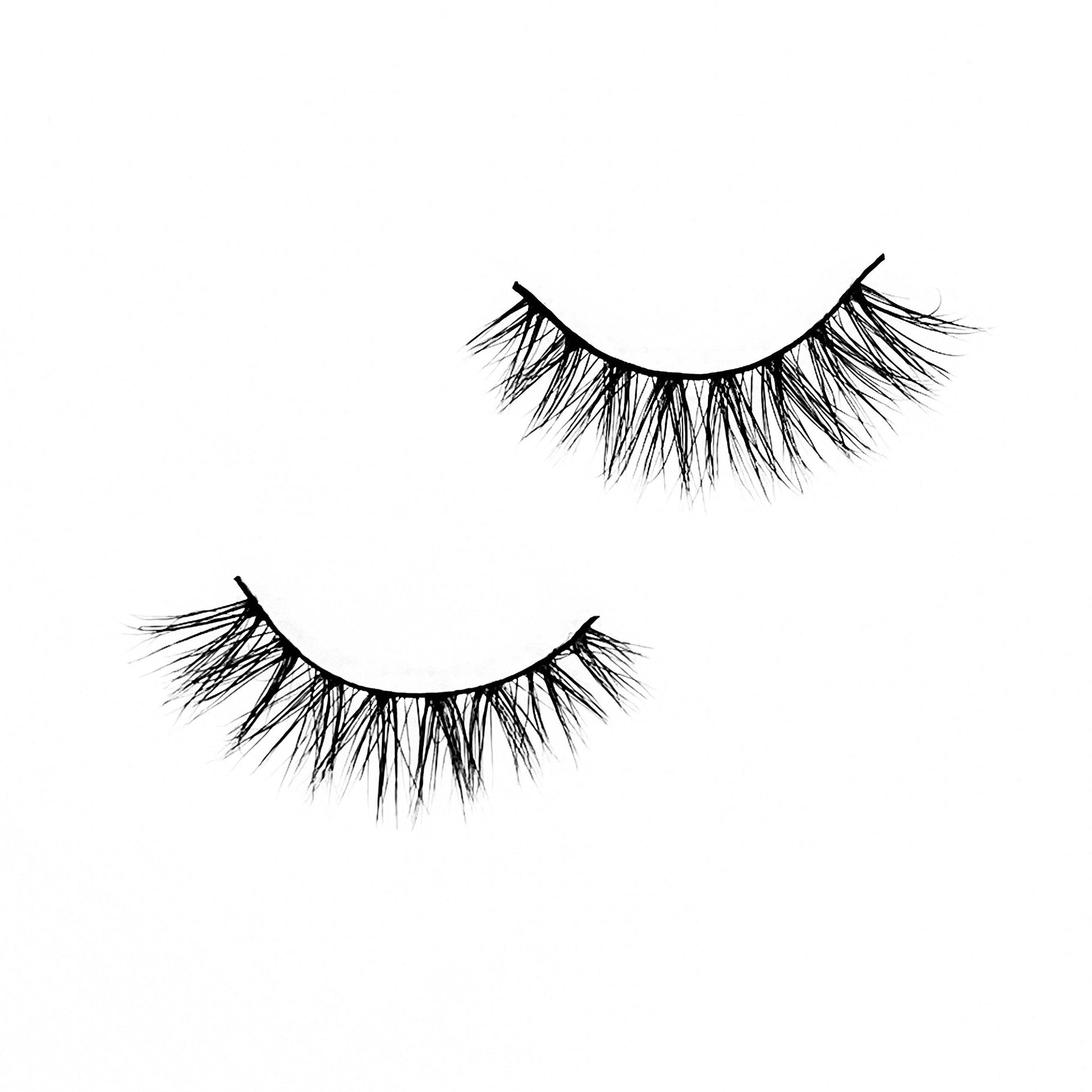 Butterfly-Medium Volume-“Butterfly” is a natural yet unique 3D lash that’s perfect for everyday looks. Our light volume “Butterfly” lashes add the finishing touch to any everyday, on the go, natural look. The unique design and cat-eye effect from these lashes will have you hooked! Description Handmade, Cruelty-Free, Wear up to 30x Material: 100% Mink Band: Black Cotton Band Volume: Medium Style: Wispy, Cat-eye, Flirty, Natural To Use: Measure and size your lashes by placing the false lash agains
