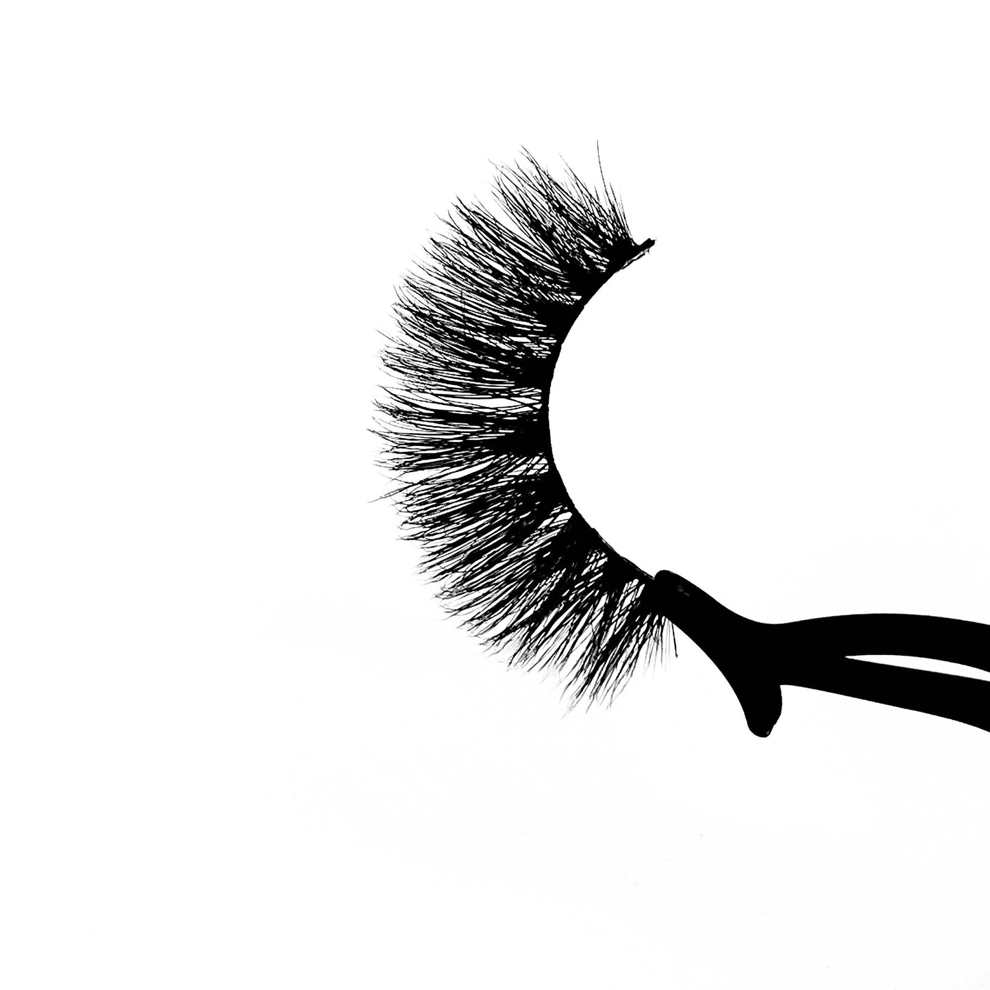 Hustla-High Volume-Sexy, sassy, and bold. The 3 moods guaranteed in our "Hustla" lashes. Pick "Hustla" for full volume, curl, and length. You'll always be picture ready in these glamorous mink lashes! Also available in our "Boss Up (3-Pack)" Description Handmade, Cruelty-Free, Wear up to 30x Material: 100% Mink Band: Thin, Black Cotton Band Volume: High Style: Dramatic, Long, Open-eye To Use: Measure and size your lashes by placing the false lash against your lash line where your natural lashes