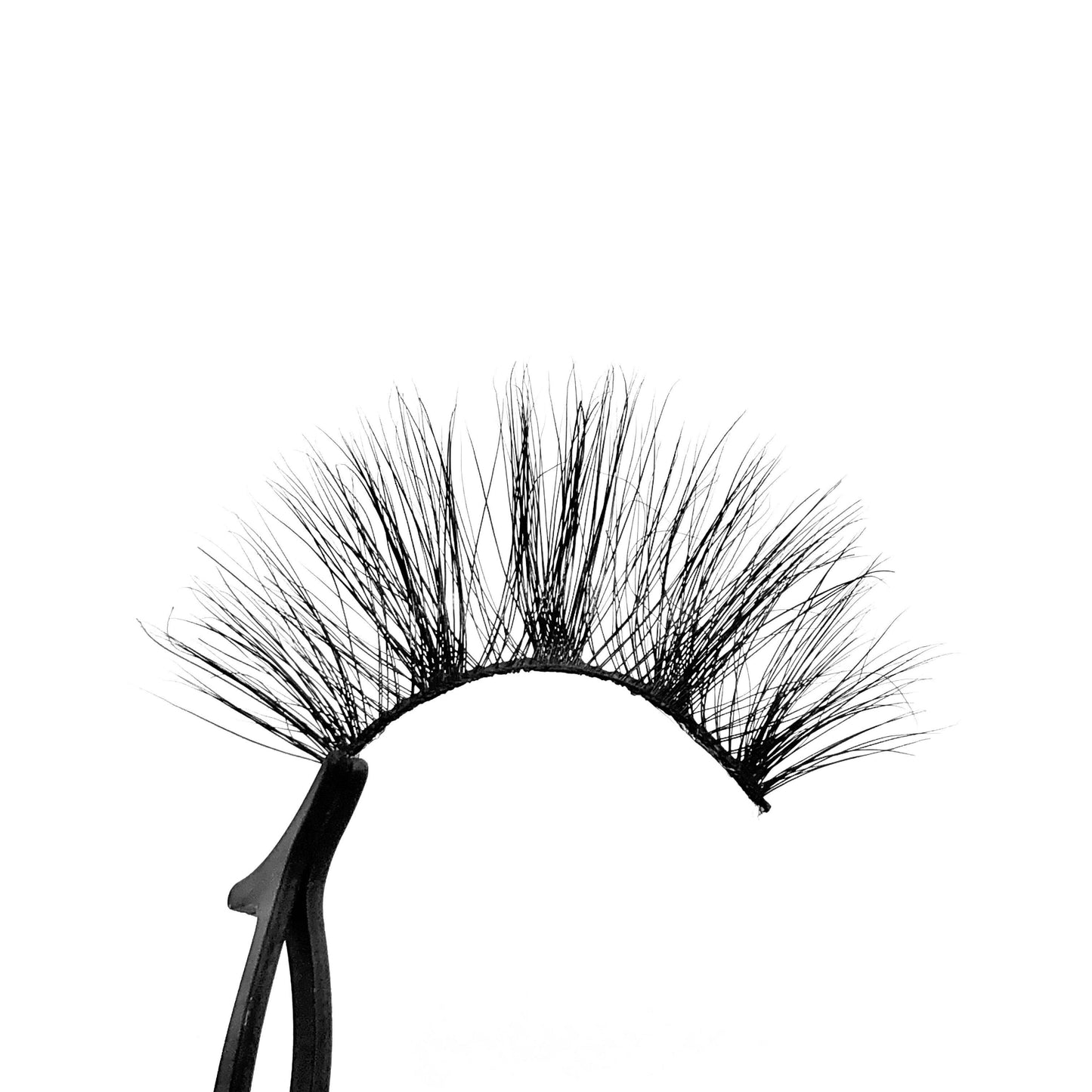 Cardi-Mega Volume-"Cardi” is the more dramatic, longer version of our “Serenity” lashes. These long, 25mm, 5D mink lashes give a dramatic wispy look. Super cute, girly, and flirty. These lashes can be styled for so many different occasions. Also available in our "Alpha Femme (3-Pack)." Try our "Serenity" lashes for a shorter look! Description Handmade, Cruelty-Free, Wear up to 30x Material: 100% Mink Band: Black Cotton Band Volume: Mega Volume Style: Dramatic, X-Long, Wispy, Open-eye To Use: Mea