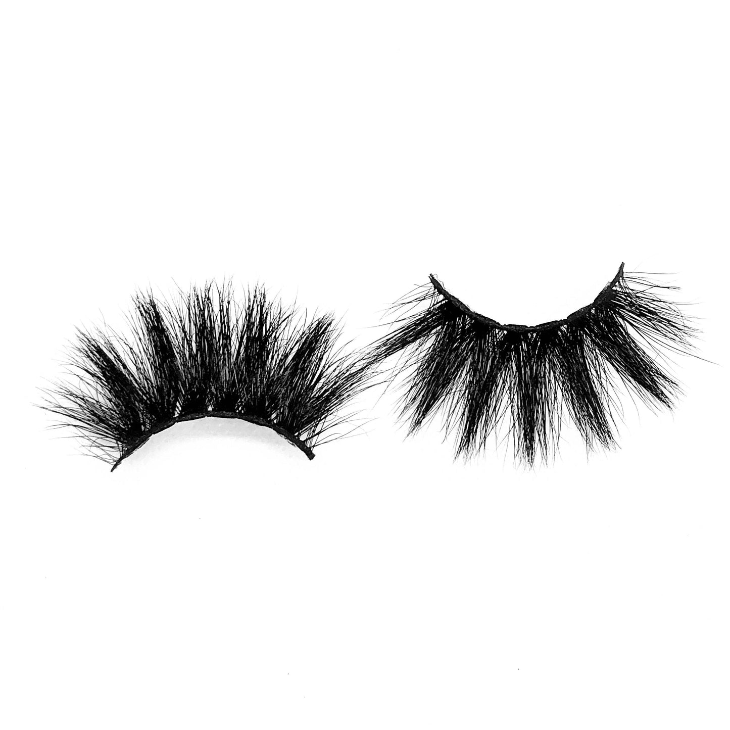 Koriyan-Mega Volume-A super soft and fluffy 5D Mink lash style. This 25mm lash “Koriyan” is amazing for a bold, dramatic look. These super cute, crisscross lashes will definitely make you stand out. The perfect style to add glam on your night out. Also available in our "Alpha Femme (3-Pack)." Description Handmade, Cruelty-Free, Wear up to 30x Material: 100% Mink Band: Black Cotton Band Volume: Mega Volume Style: Dramatic, X-Long, Wispy, Open-eye To Use: Measure and size your lashes by placing th