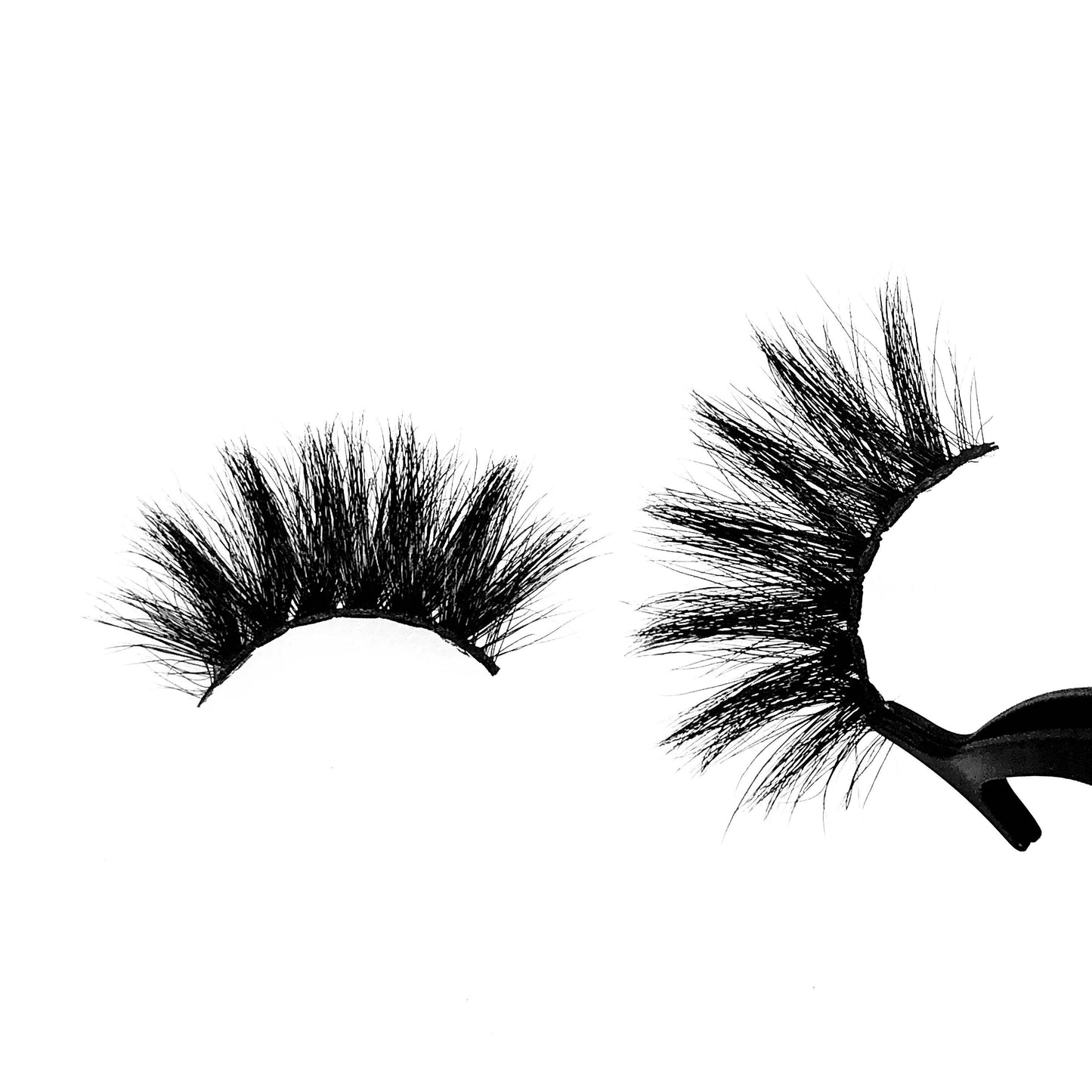 Koriyan-Mega Volume-A super soft and fluffy 5D Mink lash style. This 25mm lash “Koriyan” is amazing for a bold, dramatic look. These super cute, crisscross lashes will definitely make you stand out. The perfect style to add glam on your night out. Also available in our "Alpha Femme (3-Pack)." Description Handmade, Cruelty-Free, Wear up to 30x Material: 100% Mink Band: Black Cotton Band Volume: Mega Volume Style: Dramatic, X-Long, Wispy, Open-eye To Use: Measure and size your lashes by placing th