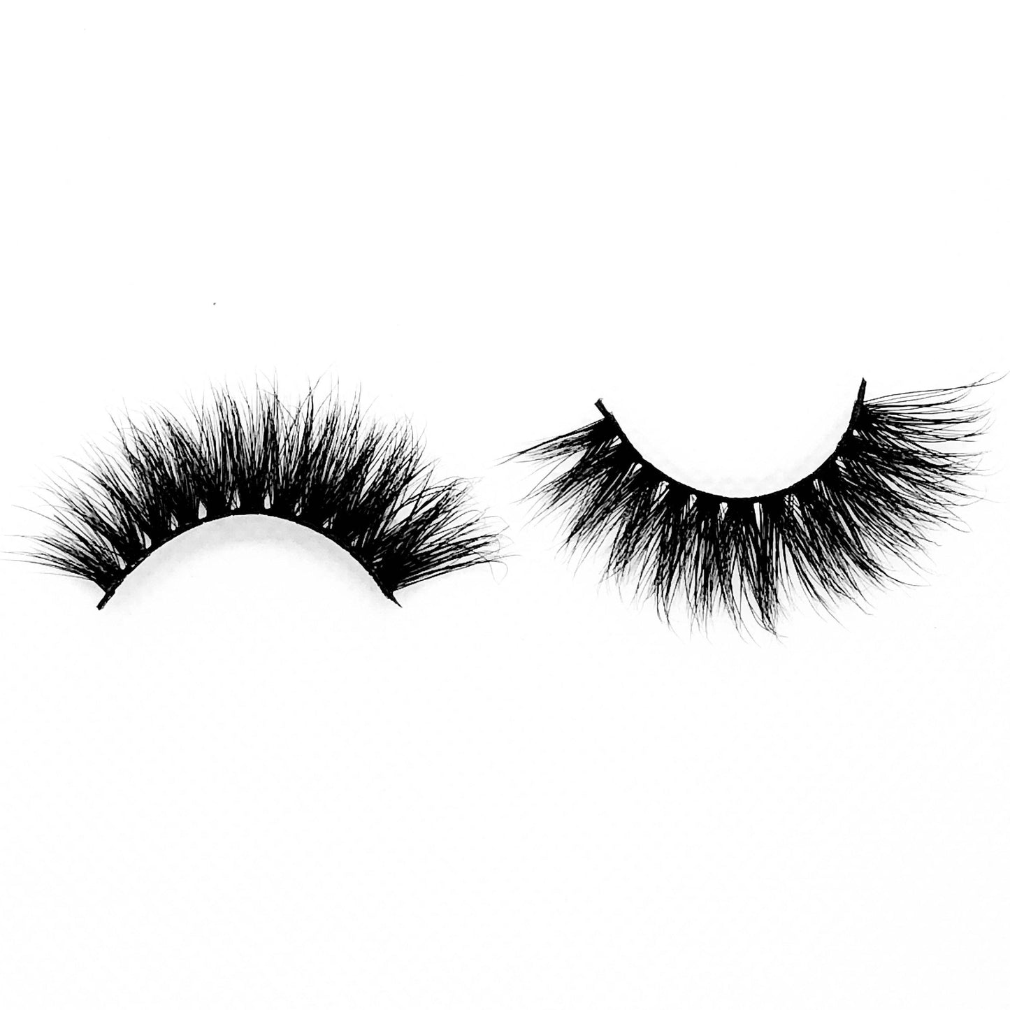 Queen-High Volume-"Queen" lashes are for our GLAM QUEENS. You’ll fall in love these stunning mink lashes because of their fluffiness and the extra curl on the outer corners. They're super comfortable and lightweight on your eyes for everyday wear. Whether you’re all about glam, or simply looking to up your lash game... you’ll LOVE this style! Also available in our "Dramatic (3-Pack)" Description Handmade, Cruelty-Free, Wear up to 30x Material: 100% Mink Band: Thin, Black Cotton Band Volume: High