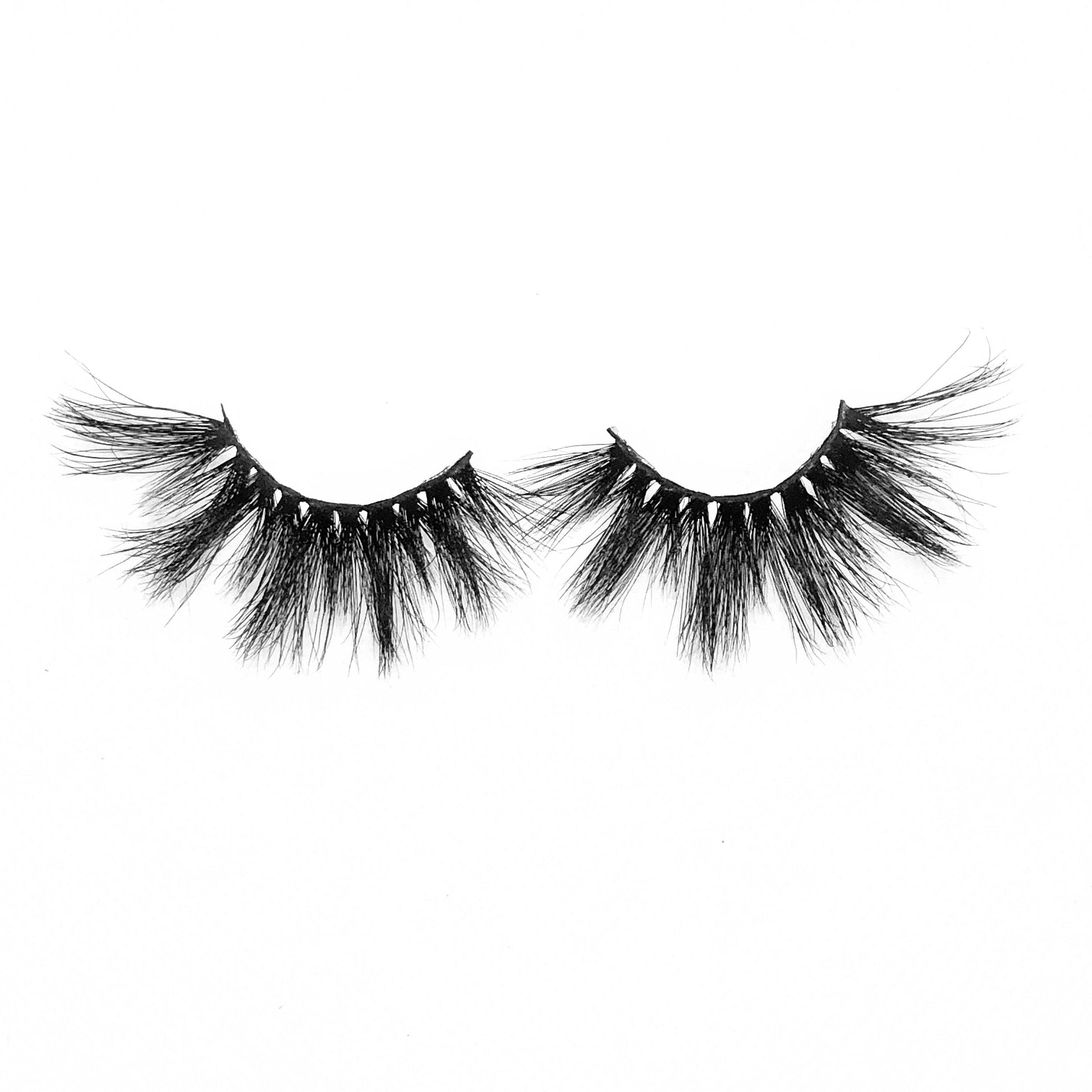 Alpha Femme (3-Pack)-Mega Volume-This set includes (3) 25mm mink lashes: Cardi Chyna Koriyan Description Handmade, Cruelty-Free, Wear up to 30x Material: 100% Mink Band: Black Cotton Band Volume:Mega Volume Style: Extra Long, Dramatic, Wipsy To Use: Measure and size your lashes by placing the false lash against your lash line where your natural lashes start. Using Mini Scissors, cut off the excess lash band length from the outer corners to ensure they fit properly. Apply a layer of Lash Adhesive