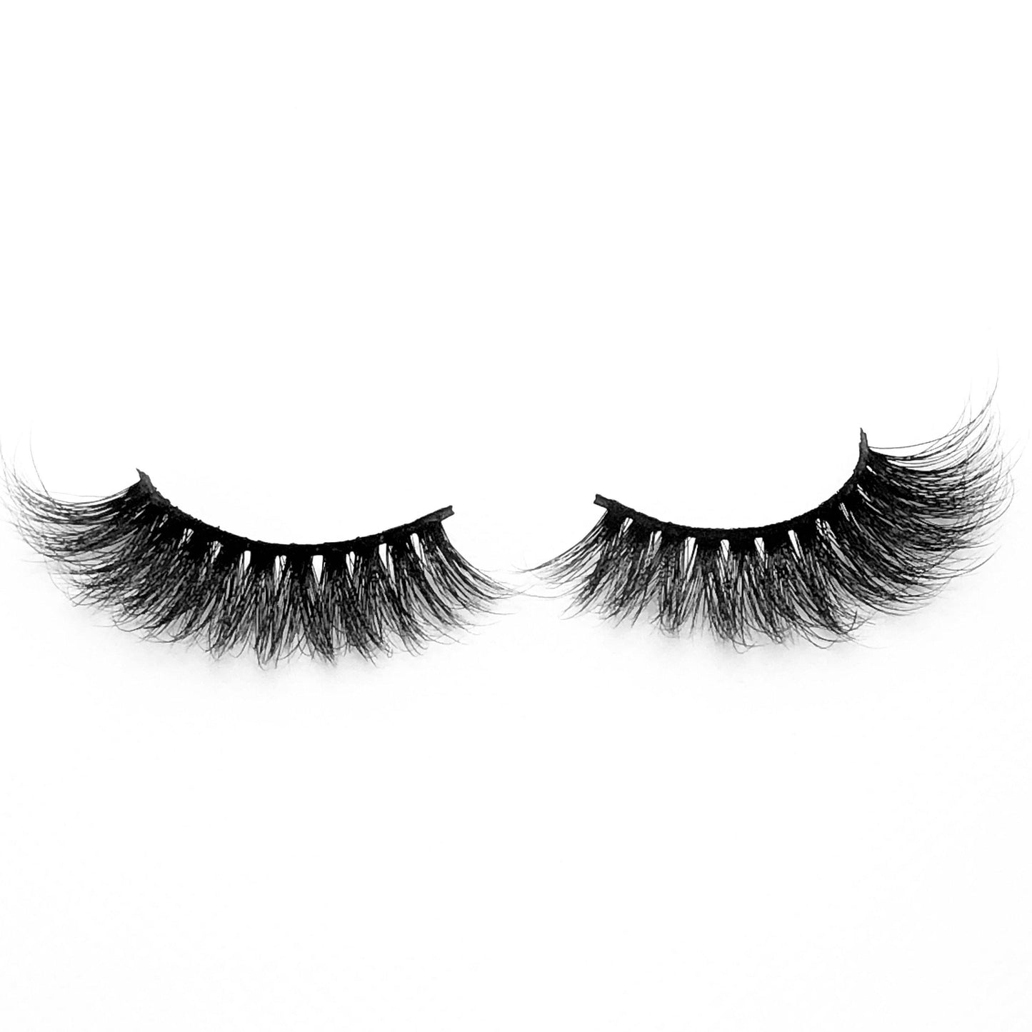 Queen-High Volume-"Queen" lashes are for our GLAM QUEENS. You’ll fall in love these stunning mink lashes because of their fluffiness and the extra curl on the outer corners. They're super comfortable and lightweight on your eyes for everyday wear. Whether you’re all about glam, or simply looking to up your lash game... you’ll LOVE this style! Also available in our "Dramatic (3-Pack)" Description Handmade, Cruelty-Free, Wear up to 30x Material: 100% Mink Band: Thin, Black Cotton Band Volume: High