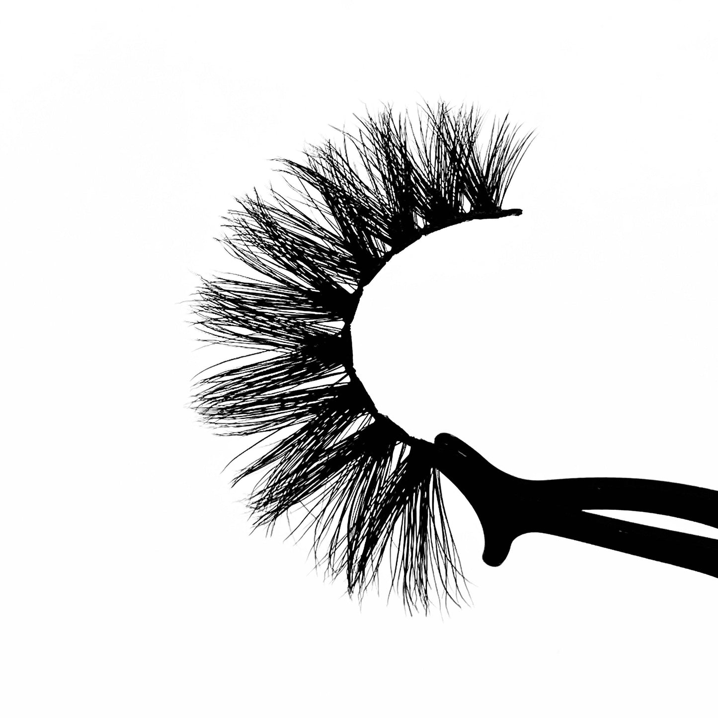 Finesser-High Volume-You're guaranteed to get away with anything in our full and fluffy "Finesser" lashes. "Finesser" is longer on the outer corners, giving you a fierce cat-eye look. These lashes serve extra glam for our ladies that love a sexy, wispy, dramatic look! Also available in our "Boss Up (3-Pack)." Try our "Amour" lashes for a shorter look! Description Handmade, Cruelty-Free, Wear up to 30x Material: 100% Mink Band: Thin, Black Cotton Band Volume: High Style: Dramatic, Long, Wispy, Ca