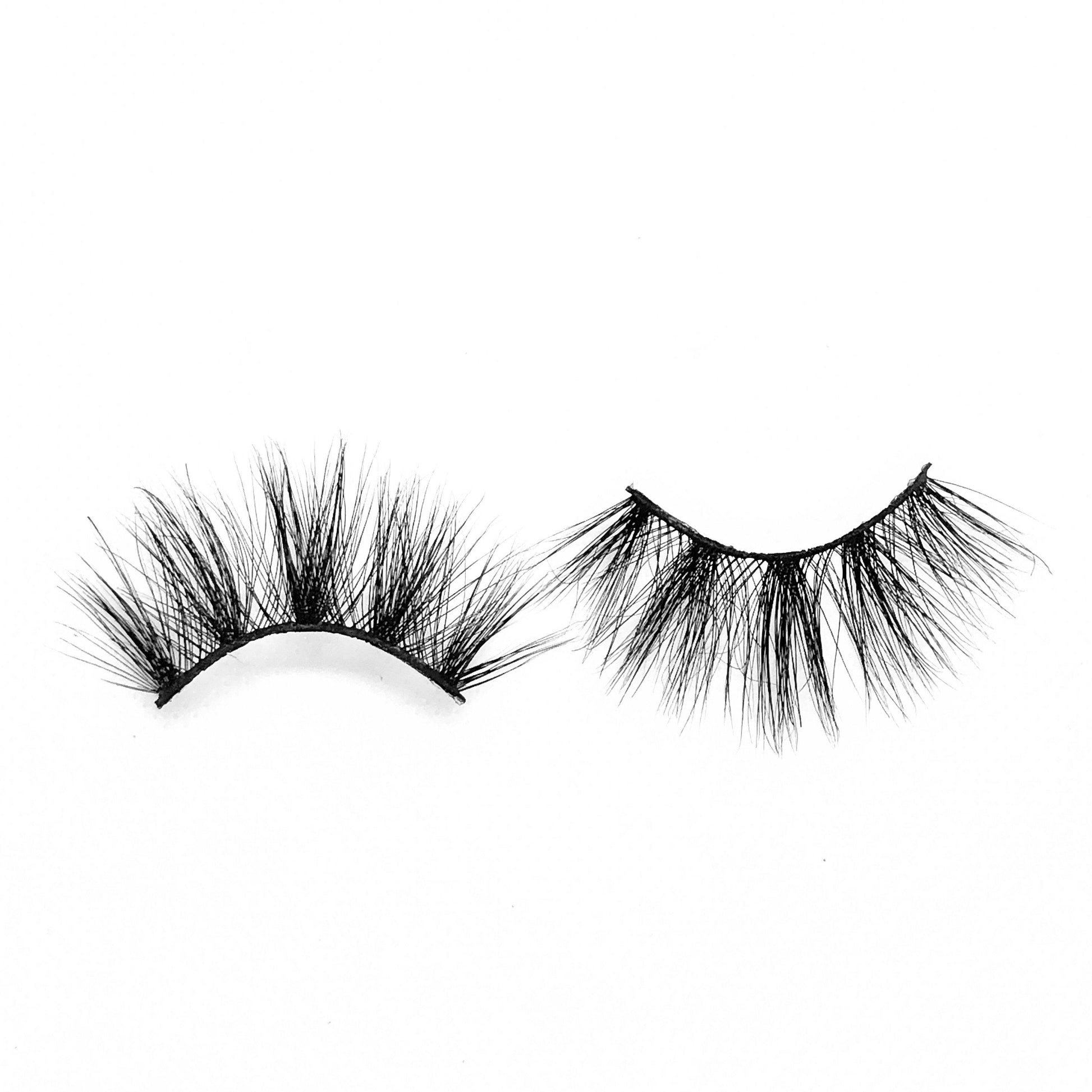 Cardi-Mega Volume-"Cardi” is the more dramatic, longer version of our “Serenity” lashes. These long, 25mm, 5D mink lashes give a dramatic wispy look. Super cute, girly, and flirty. These lashes can be styled for so many different occasions. Also available in our "Alpha Femme (3-Pack)." Try our "Serenity" lashes for a shorter look! Description Handmade, Cruelty-Free, Wear up to 30x Material: 100% Mink Band: Black Cotton Band Volume: Mega Volume Style: Dramatic, X-Long, Wispy, Open-eye To Use: Mea