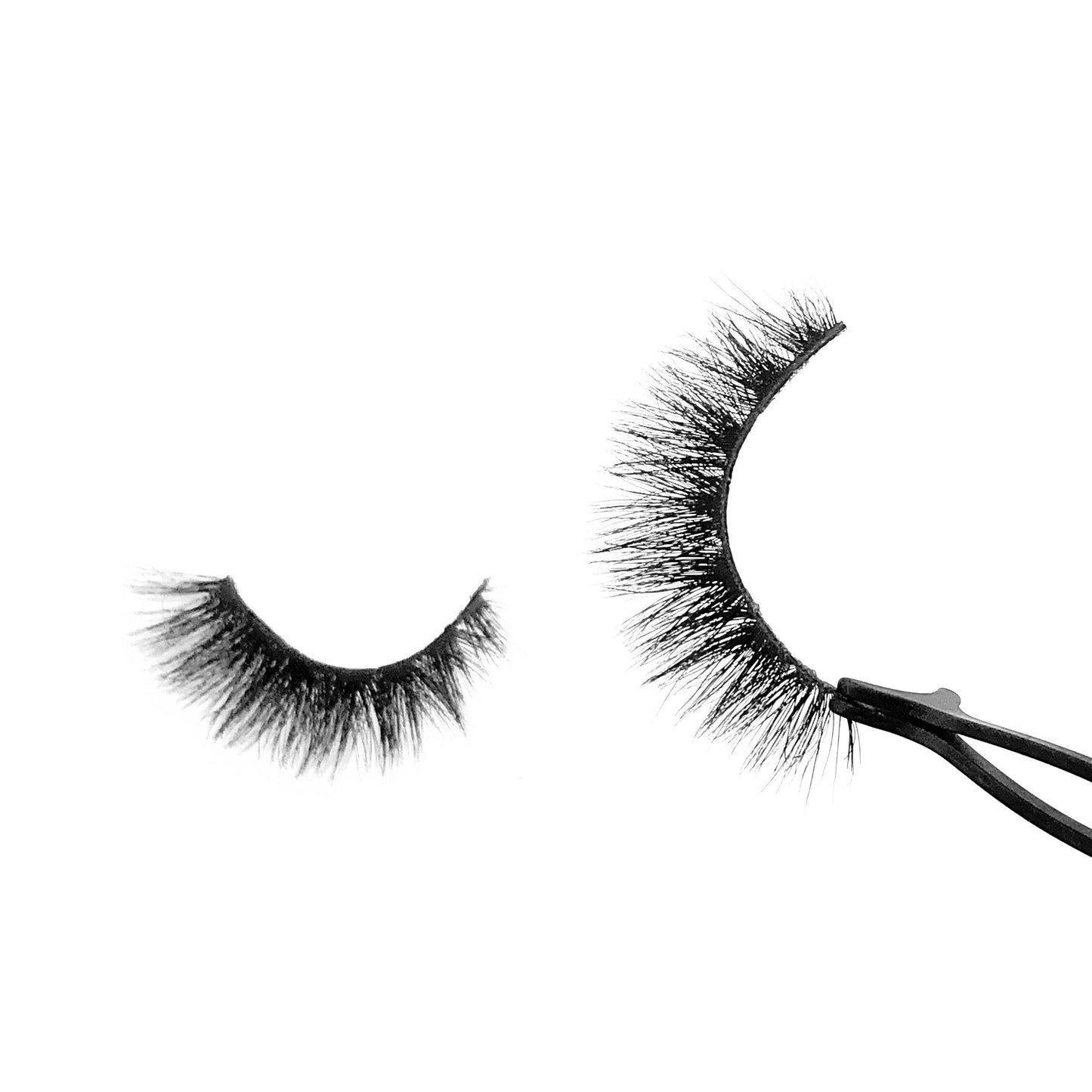 Amour-High Volume-"Amour" is the perfect short length and volume combo for full, fluffy, and flirty 5D mink lashes. Super lightweight, comfortable, and versatile for any occasion. With a slightly shorter inner corner to mimic your natural lashes, they add the perfect glam to your look without being too extra. Try our "Finesser" lashes for a longer look! Description Handmade, Cruelty-Free, Wear up to 30x Material: 100% Mink Band: Black Cotton Band Volume: High Style: Short, Flirty, Cat-eye, Drama